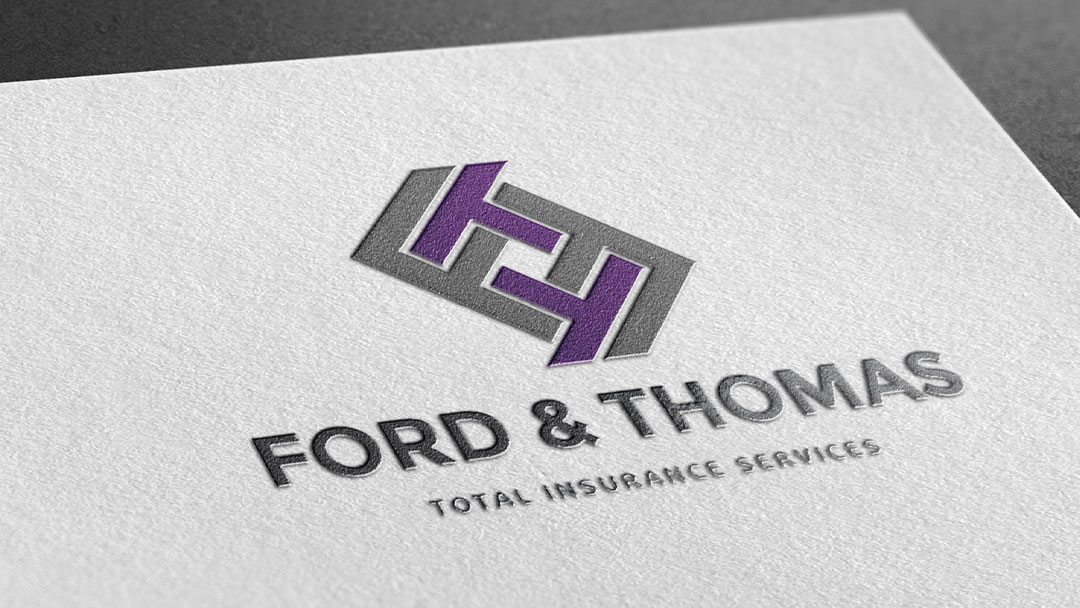 Mockup of logo on paper for Ford and Thomas